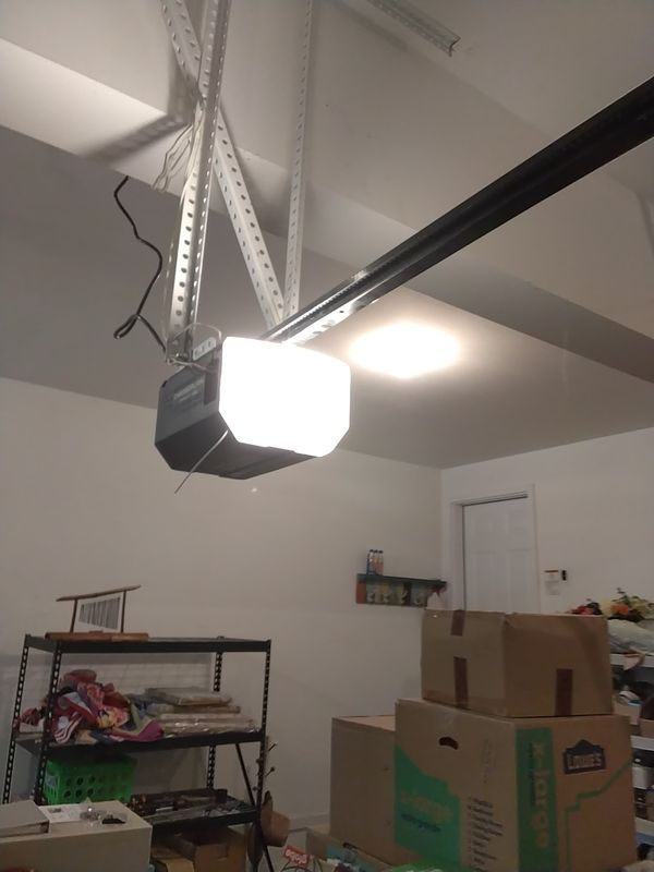 Garage door opener repair Williamsburg: new Chamberlain belt-drive opener with a 7-foot rail installed in Ford's Colony